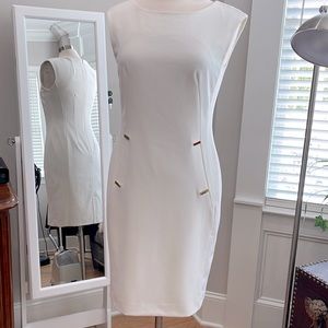 Calvin Klein Sz 6 NWOT Beautiful white dress with gold detail lined never worn